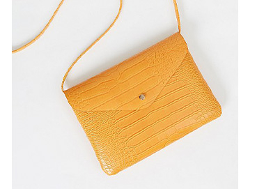 Mustard yellow mock croc cross body bag