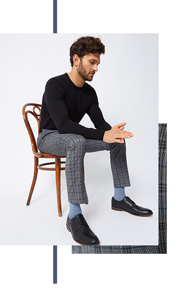 Mix and match grey check suit bottoms with a black top