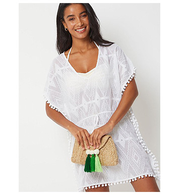 Perfect for popping on over your bikini, this stylish kaftan style cover up is just made for sunny days