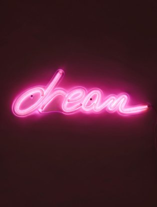 Neon pink dream slogan light up sign.