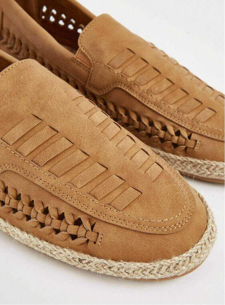 Tan woven loafers.