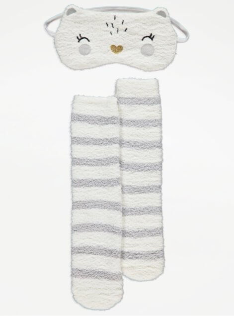 Eye mask and stripey bed socks.