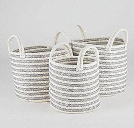 Three grey and white striped storage baskets with handles