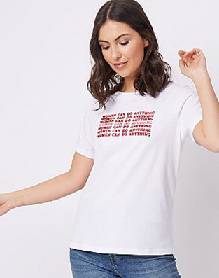 Woman in white slogan t-shirt