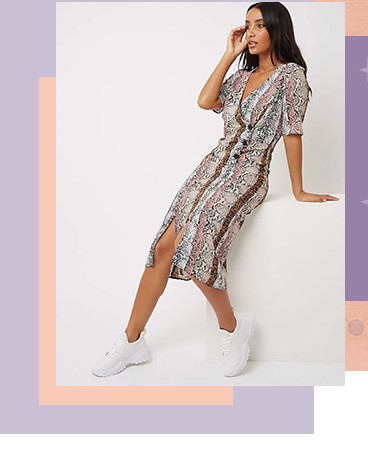 This midi wrap dress is designed with standout snakeskin print