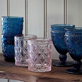 A selection of blue and pink drinking glasses