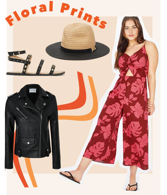 Woman poses wearing red tropical floral print knot front jumpsuit and black flip flops. Cut outs of black faux leather biker jacket, black studded sandals and contrast trim snaffle buckled fedora hat.