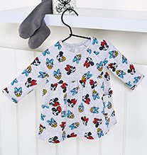 White Disney Minnie Mouse and Daisy Duck smock top.