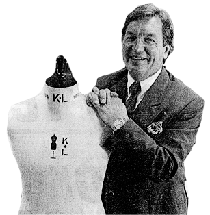 George Davies, founder of George, standing next to a mannequin