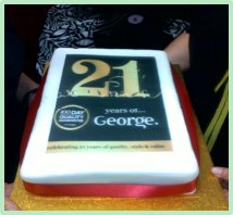 Cake with 21st Birthday decorations to celebrate George's 21st anniversary