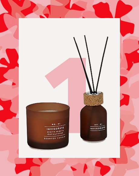 Amber glass candle and reed diffuser set.