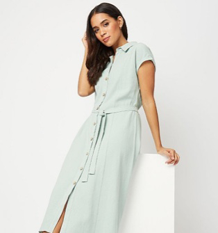 Woman wearing a turquoise tie waist shirt dress