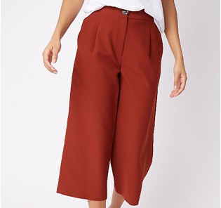 Woman wearing rust straight leg culottes