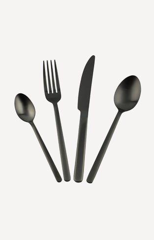 A knife, fork, dessert spoon and teaspoon from a matt black cutlery set