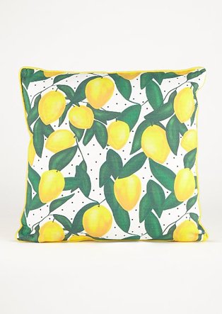 White cushion with yellow lemons and green leave pattern