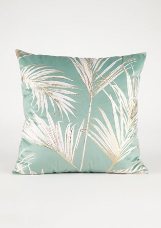 Green cushion with leaf pattern