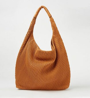 A tan handbag.