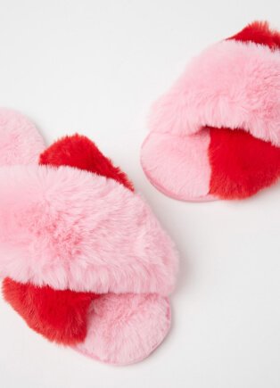 Pink and red fluffy cross over slippers.