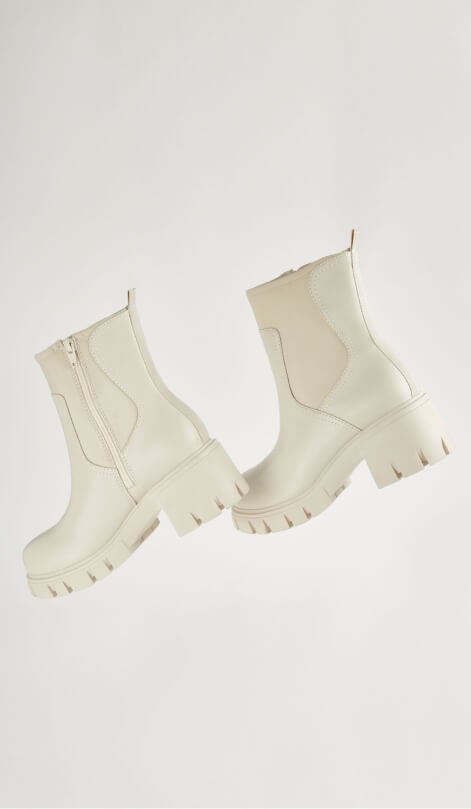 Cream chunky sock boots.