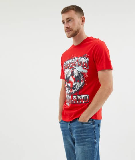 A man wearing an England football t-shirt.