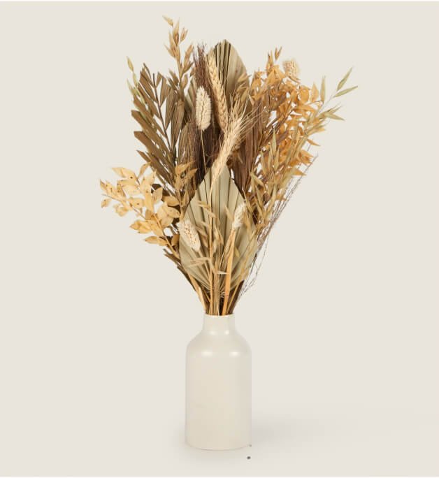 Pampas grass in a white vase