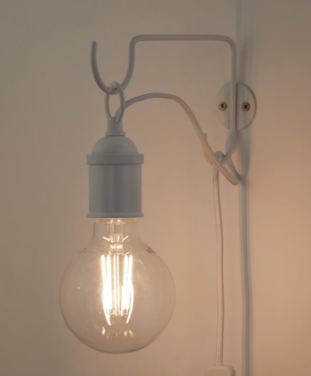 A white hanging bulb lamp.