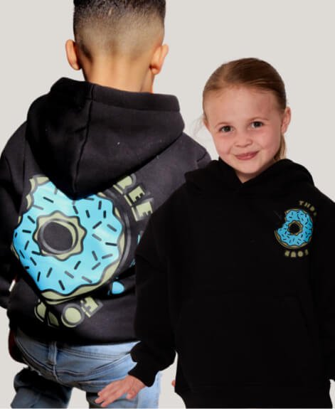 A girl and boy wearing a unisex black DOH hoodie.