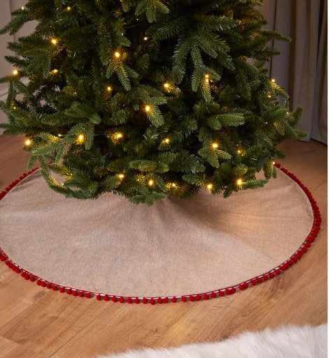 A christmas tree with warm fairy lights