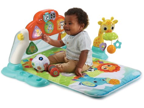 A baby playing with a sensory toy.