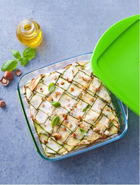 A courgette bake in a glass storage container.