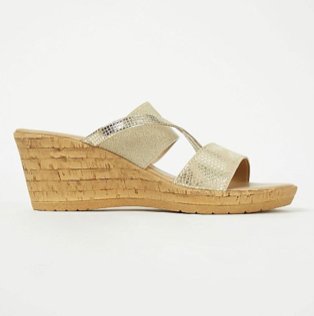 Gold cork effect wedge heel sandals.