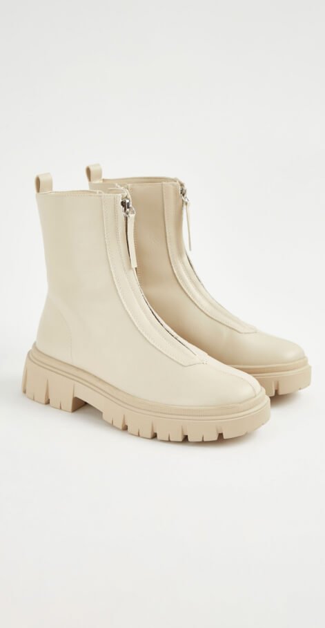 Cream high top boots.