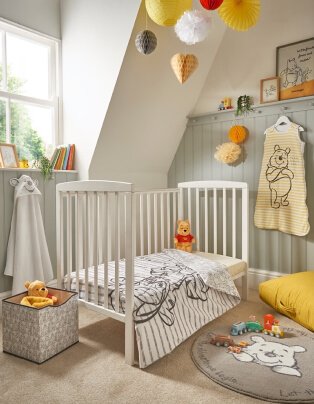 Nursery with cot, toys, mat and sleepbag.
