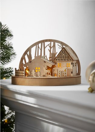 Light-up wooden Christmas scene ornament.