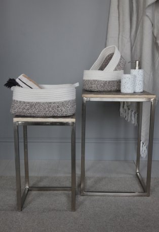Bathroom stools with baskets.
